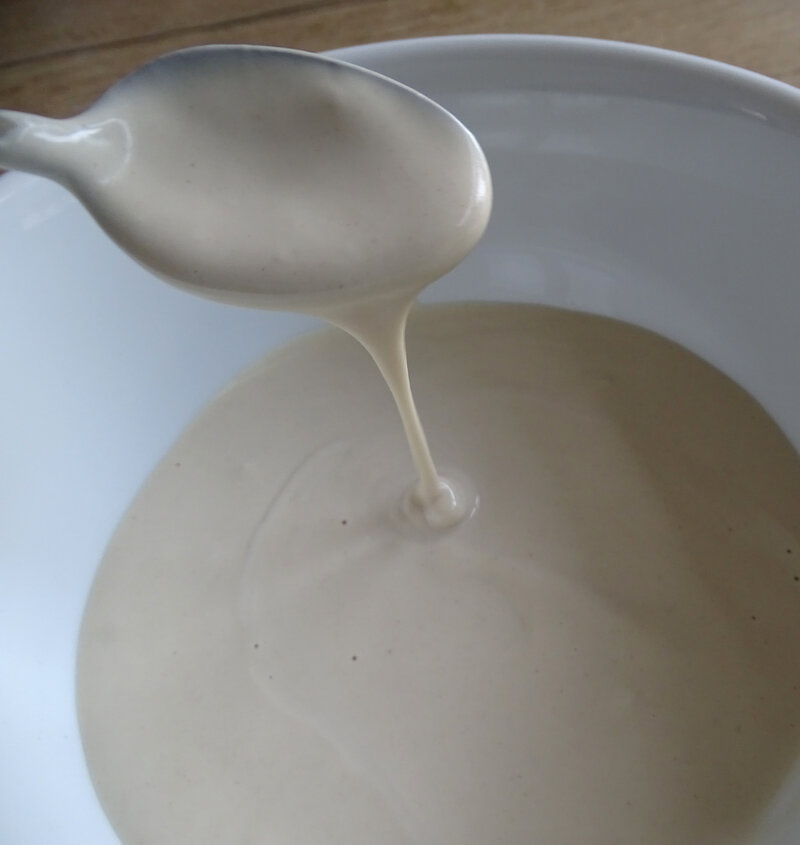 The finished tahini sauce is creamy and smooth