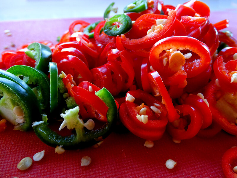 The chillies are sliced into rounds