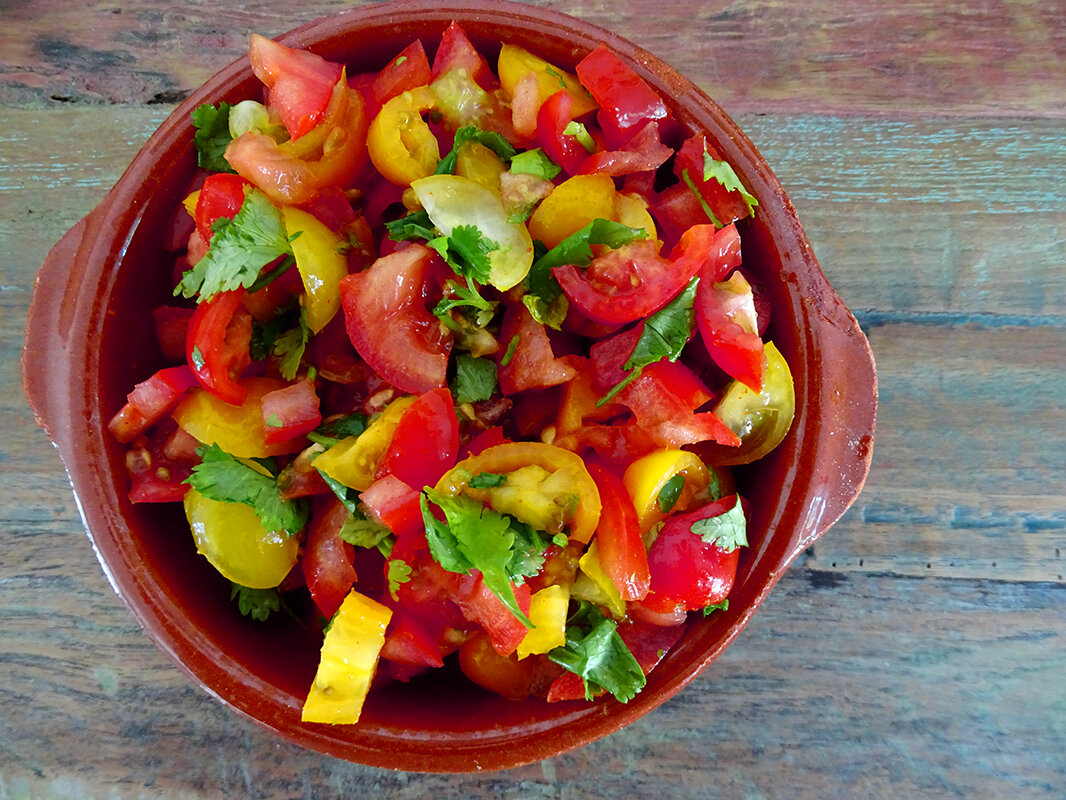 Zingy tomato salsa, with coriander, red and yellow cherry tomatoes, cayenne and lemon juice